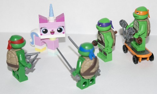 I have no reason for taking the picture like this... Unikitty just happened to be by the Turtles on my shelf